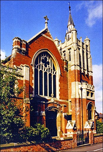 The present Church showing the wooden spire prior to its removal in 1986