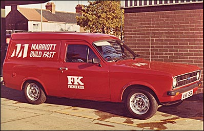 A picture of one of Marriott's vans with the 'build fast' logo on the side