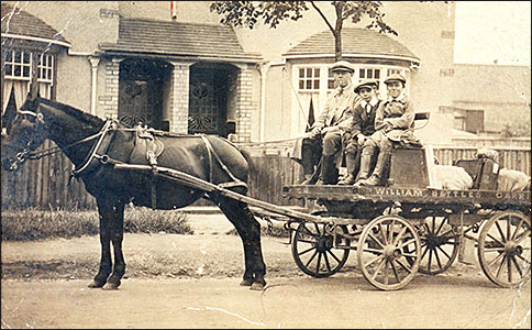 Wm H Bettles with his cart