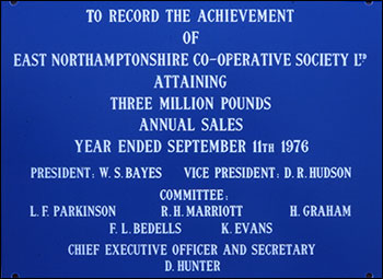 plaque marking three million pounds sales for East Northants Co-op Society Ltd in 1976