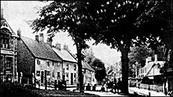 Photograph showing the cottages next to the Wheatsheaf.