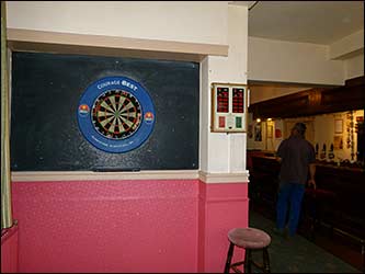 dart board and bar area