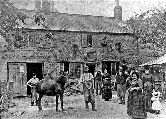 The family outside the smithy
