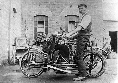 motorcycle and wicker side-car