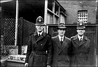 Arthur Evans with two colleagues at the back of Rushden Police Station 1951