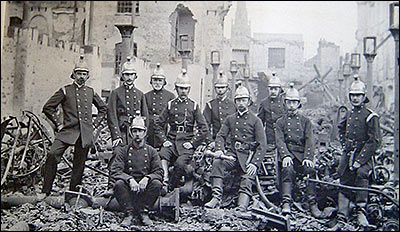 Photograph of Rushden firemen after the fire at Cave's 1901