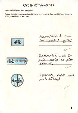 Page from the work book about signs for cyclists