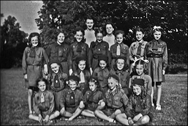 Brownies with their Pack Leaders Jose and Joan. Picture taken in the park 1949 