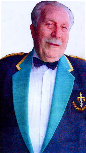 photograph of Eric Mackness-Retiring after 77 years service with the Rushden Mission Band.