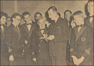 Photograph from Evening Telegraph showing Maurice Clark conductor with some band members.