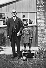 Philip,aged 6, with his grandfather, John G. Leeding, who started the business.