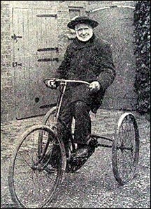 George on his tricycle