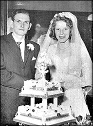 Norma Smith & Tony Warren cutting the cake.