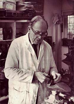 Norman Shortland in his shop at the back of his house