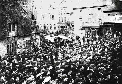 Crowds at Ward's Corner to witness the historic moment when water was turned on to the town.