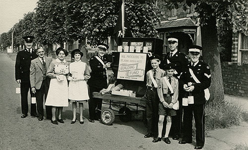 HF St John's Ambulance collecting with barrel organ.