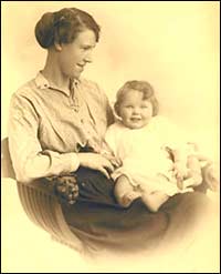 Aged two with her mother