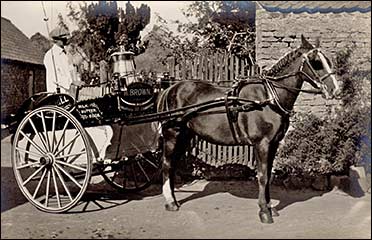 With horse and cart c1910