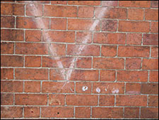 V sign on a wall
