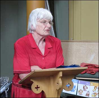 Lilian Butler delivering her farewell poem