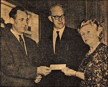 Miss Nichols recieves her cheque