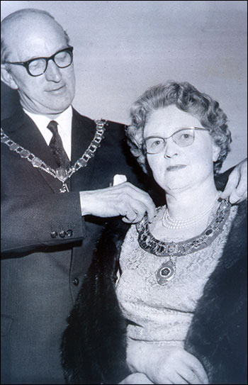 Mr Griffiths becomes Chairman of the Council & presents his wife with her chain of office