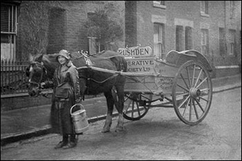 Miss Reed delivering milk