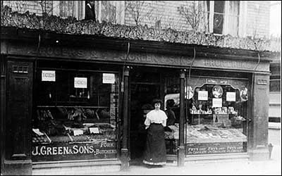 Photo of Flo Green, outside the shop in High Street, Rushden