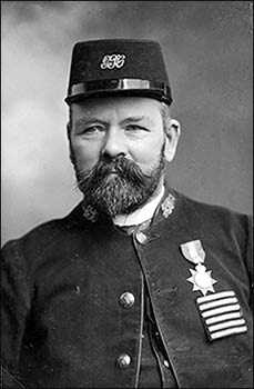 In his uniform with long service medal