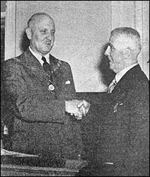 Mr Brown greets Mr Ginns