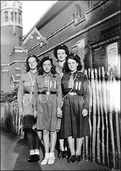 guides outside the church