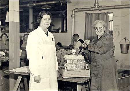 Mrs Parker cuts her cake