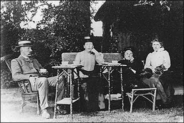The family in the Shrubbery garden
