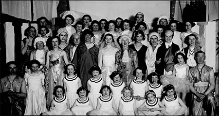 The cast all on stage