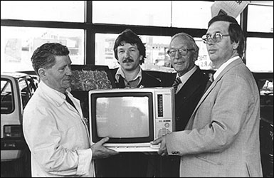 Ken presented with a Television set