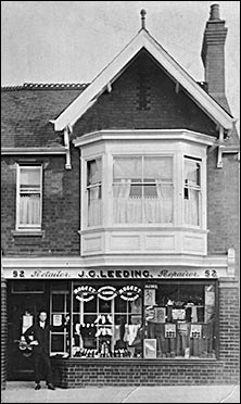 Philip's father, Edgar, outside the shop.