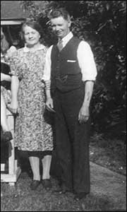 Reg & his wife in the garden