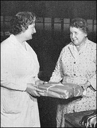 Elsie Dunkley receiving her retirement present.