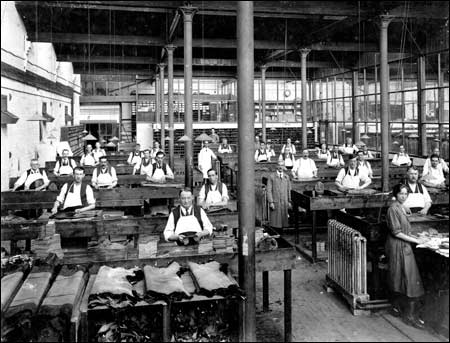 Workers inside Caves factory