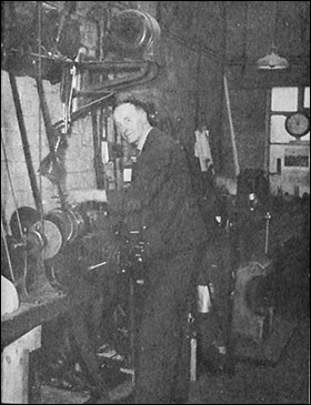 A. Berrill at the lathe