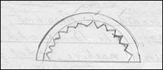 Drawing showing nicks made in curved edges for ease of folding