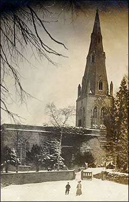 Postcard of church in snow