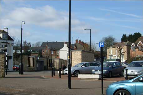 Both bus shelters, toilet between