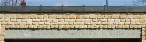 The stone lintel across the front of the bus shelter